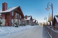 Street with row of winter chalet on the ski resort