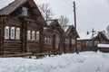 Street of russian ancient two-storied wooden houses in Kizhma village. Arkhangelsk region, Russia