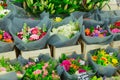 Street sale of flower bouquets near metro station.Roses,tulips, carnations,lilies,gypsophila,hyacinths,chrysanthemums. Selling for