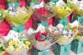 Street sale of flower bouquets near metro station.Roses,tulips, carnations,lilies,gypsophila,hyacinths,chrysanthemums. Selling for