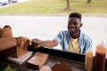 African american man buying wok at food truck Royalty Free Stock Photo
