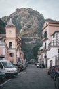 Street scene with architecture and mountains in Cetara, on the Amalfi Coast, in Campania, Italy Royalty Free Stock Photo