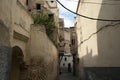 Alley way through residential neighborhood in the medina Royalty Free Stock Photo