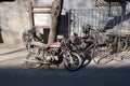 Street Scene with Bicycle and Motorbike in front of a courtyard door in Beijing