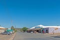 Street scene, with businesses, people and vehicles, in Griekwastad