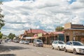 Street scene, with businesses people and vehicles, in Ladybrand