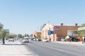 Street scene with businesses and vehicles in Karibib