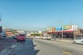 Street scene, with businesses and vehicles, in Nelspruit Royalty Free Stock Photo