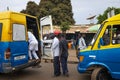 Street scene in the city of Bissau with people boarding a public bus Toca Toca at the Bandim Market, in Guinea-Bissa