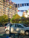 Street scene. Clothes are dried on a line. Colorful houses. Urban environment Royalty Free Stock Photo