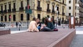 Street scene in Donostia - San Sebastian, three girls chatting, Basque Country, Spain