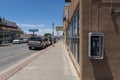 Street scene in the downtown of the city of Galllup with buidlings and stores