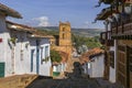 View through a typical historic street to Cathedral of the immaculate conception from a higher angle, Barichara, Colombia Royalty Free Stock Photo