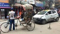 Kathmandu, Nepal - April 21, 2019. Street scene - rivalry in the long waiting passengers