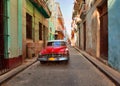 Street scene with an old rusty american car