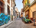 Street scene with an old rusty american car Royalty Free Stock Photo