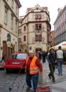 Street scene in the Old Town, pedestrians, tourists and workers, Prague, Czechia