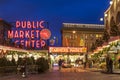 Street scene of Pike Place Market at Christmas with tourists and holiday decorations, Seattle, Washington, United States