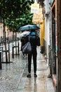 Street scene a rainy day in Malasana district in Madrid