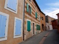 Street scene of red Luberon village Roussillon in Provence, France Royalty Free Stock Photo