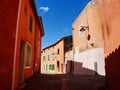 Street scene of red Luberon village Roussillon in Provence, France Royalty Free Stock Photo