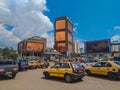 Street scene with road traffic in the center of Yaounde, at the Central Apostle with buildings and administrative buildings