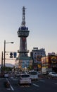 Street scene and Tower of Beppu in the evening. Lattice Communication Tower with observation deck. Beppu, Oita Prefecture, Japan,