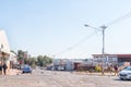 Street scene with trash strewn by protesters in Postmasburg