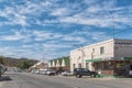 Street scene, with vehicles, people and businesses, in Williston