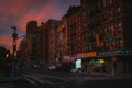 Street scene with vibrant sunset colors, in Chinatown, Manhattan, New York