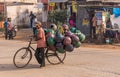 Street scene with water jug vendor, Patel Nagar, Karnataka, India