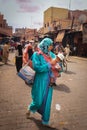 Street scene. Woman with baby. Marrakesh. Morocco Royalty Free Stock Photo