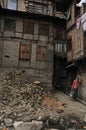 Daily street scenes from old Srinagar with hardworking people building buildings affected by violent strikes that happen of. India Royalty Free Stock Photo