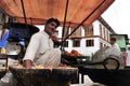 Daily street scenes from old Srinagar with people, children or animals without owners. India Royalty Free Stock Photo