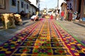 Street screen of locals producing alfombra, sawdust carpets with colorful designs for Semana Santa, Easter on the streets of Lake