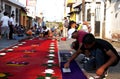 Street screen of locals producing alfombra, sawdust carpets with colorful designs for Semana Santa, Easter on the streets of Lake