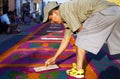 Street screen of locals producing alfombra, sawdust carpets with colorful designs for Semana Santa, Easter on the streets of Lake