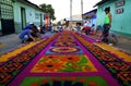 Street screen of locals producing alfombra, sawdust carpets with colorful designs for Semana Santa, Easter on the streets of Lake