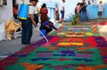 Street screen of locals producing alfombra, sawdust carpets with colorful designs for Semana Santa, Easter on the streets of Lake