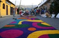 Street screen of locals producing alfombra, sawdust carpets with colorful designs for Semana Santa, Easter on the streets of Lake