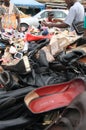 Street seller of shoes on an African market, Ghana