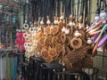 Street Seller of Traditional Bead Necklace Made From Brown Coconut Shell