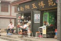 Street shop in China with Mao Tse Tung portrait Royalty Free Stock Photo