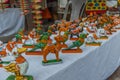 Street shop selling hand made painted ceramic toys of parrot, elephant, horse, rabbit . Chennai India Feb 25 2017 Royalty Free Stock Photo