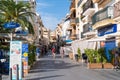 Street with shops and businesses and people Cambrils Spain Costa Dorada Tarragona Province