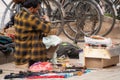 street side cobbler sitting on road and mending shoes in the winter months in sector 17 chandigarh during morning