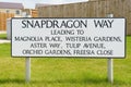 Metal Sign with Streets Named After Flowers.