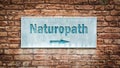 Street Sign to Naturopath