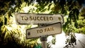 Street Sign TO SUCCEED versus TO FAIL Royalty Free Stock Photo