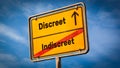 Street Sign Discreet versus Indiscreet Royalty Free Stock Photo